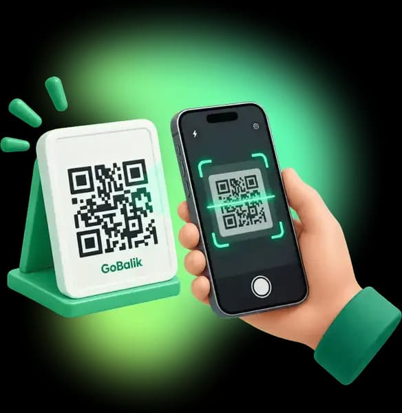 A phone camera scanning the GoBalik QR standee on the counter